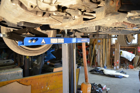 Universal under vehicle engine and gearbox support