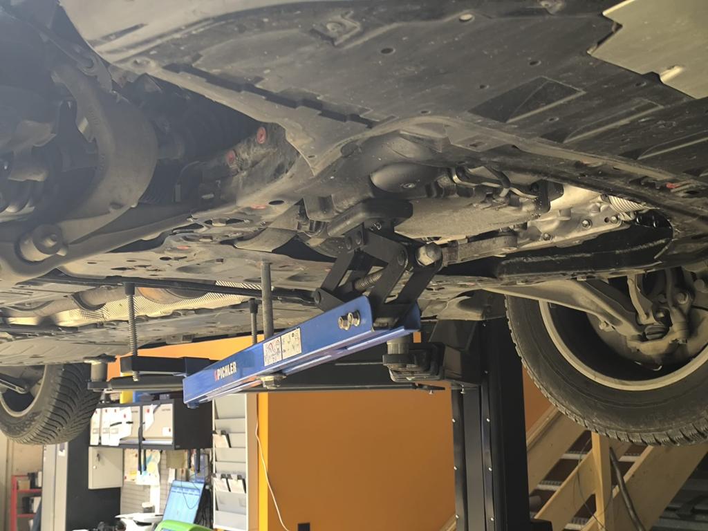 Universal under vehicle engine and gearbox support