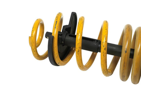 Telescopic internal spring compressor