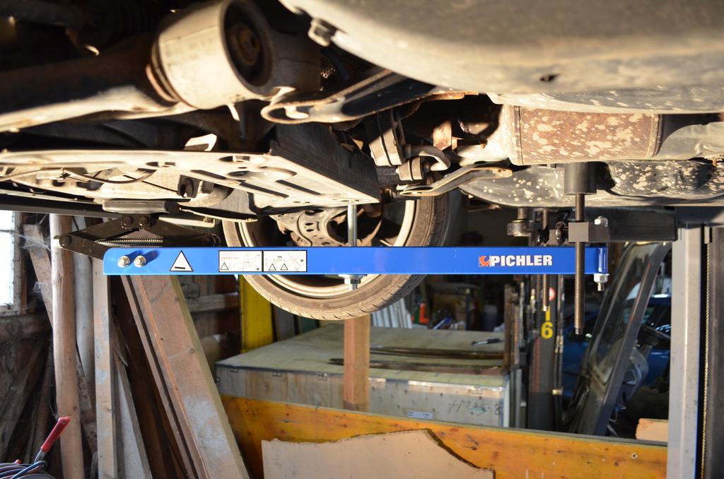 Universal under vehicle engine and gearbox support