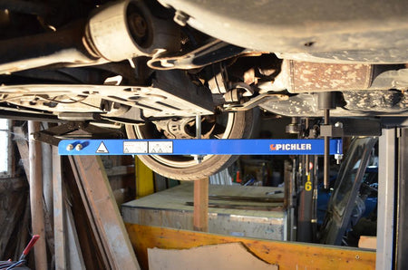 Universal under vehicle engine and gearbox support