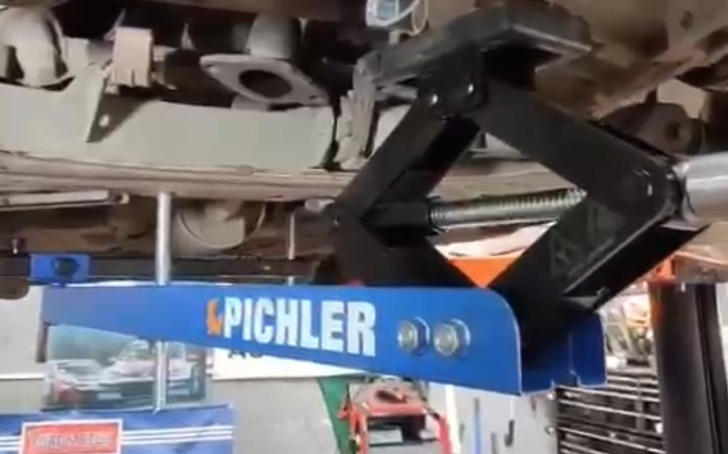 Universal under vehicle engine and gearbox support