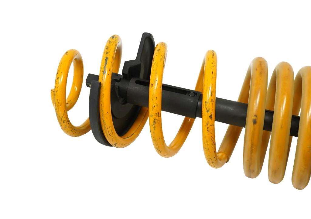 Telescopic internal spring compressor